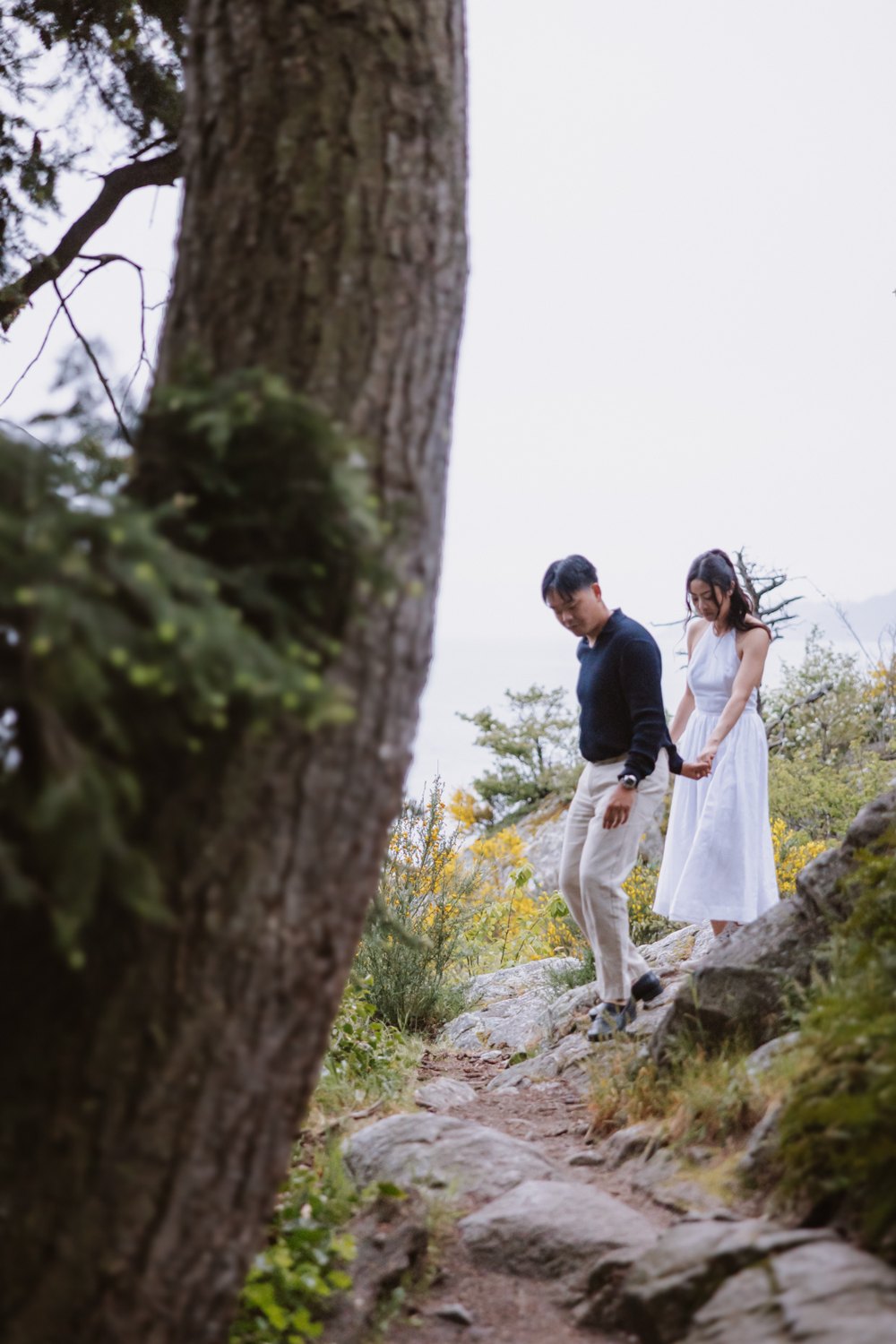 Aneeta and Christian on the cliffs high above the ocean