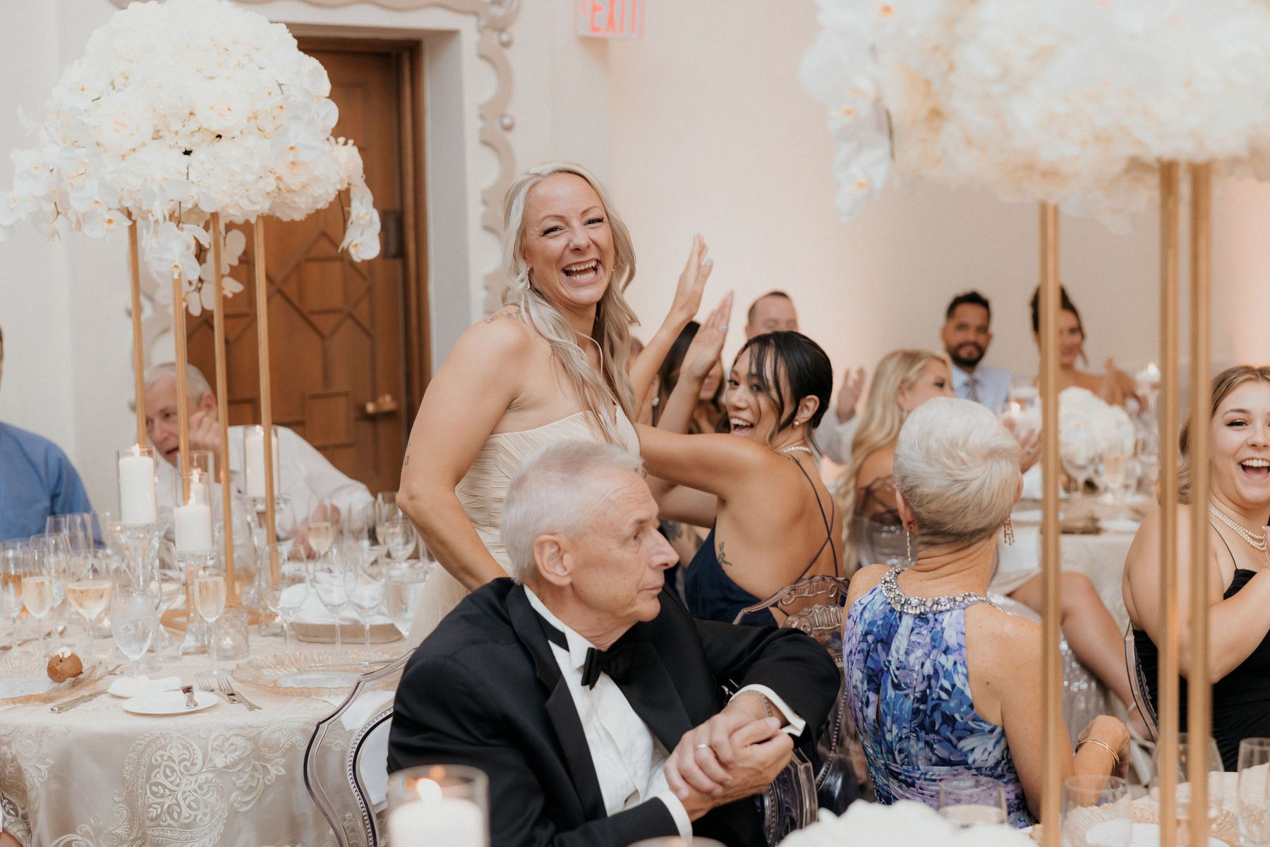Bride and groom's first dance under the ballroom chandeliers